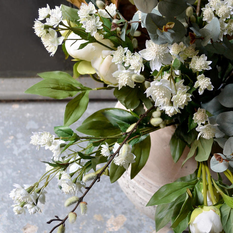 White artificial flower shop arrangements
